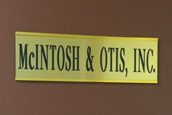 McIntosh & Otis, Inc. sign