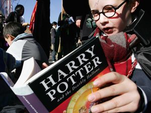 Child Reads Harry Potter